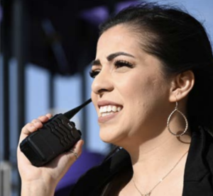 Woman holding Tait TP2 Series Radio